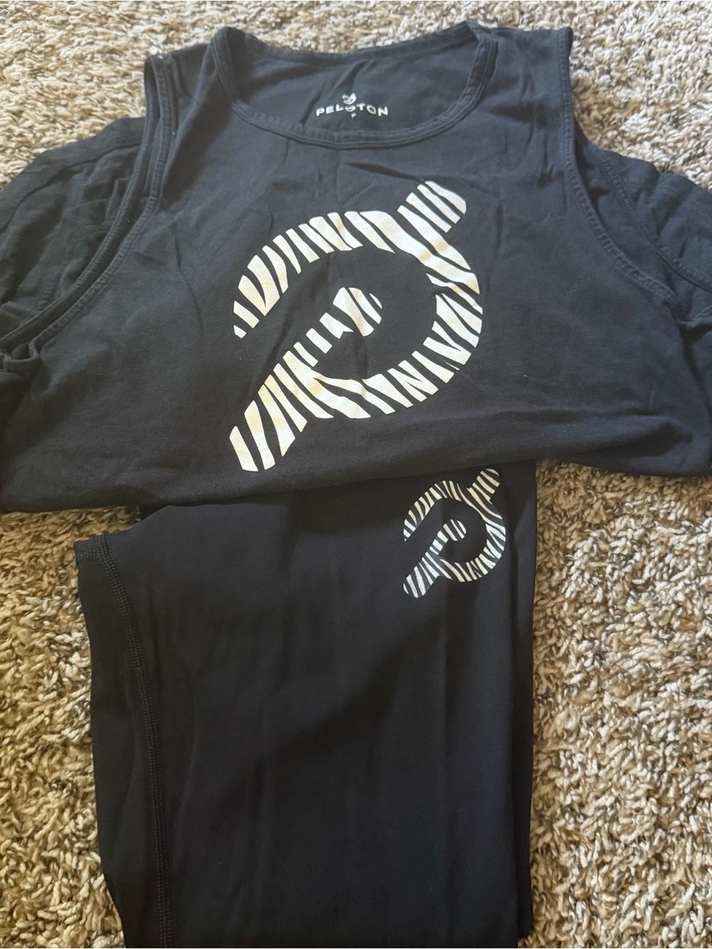 Peloton Black Tank Top with Zebra-Pattern Logo